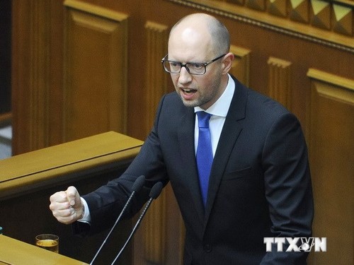 乌克兰议会拒绝接受总理亚采纽克的辞职 - ảnh 1