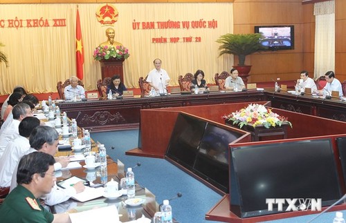 越南资源环境部部长和国家银行行长将在国会常委会会议上接受质询 - ảnh 1