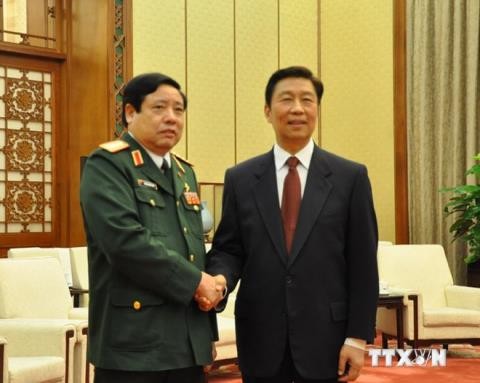 越南与中国军队加强合作 - ảnh 1
