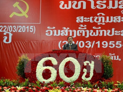 越南共产党中央委员会致电祝贺老挝人民革命党建党60周年 - ảnh 1