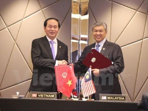 越南与马来西亚签署打击跨国犯罪合作协定 - ảnh 1