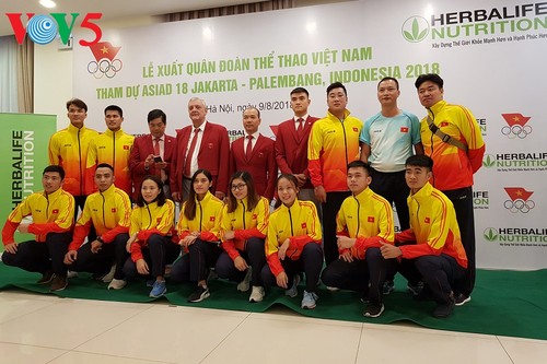参加2018年亚运会的越南代表团举行出征仪式 - ảnh 1