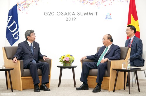 阮春福与G20峰会与会各国领导人讨论加强双边关系的措施 - ảnh 2