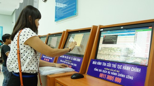 胡志明市第一郡推出准确度达99%的“无需纸笔”公共服务 - ảnh 1
