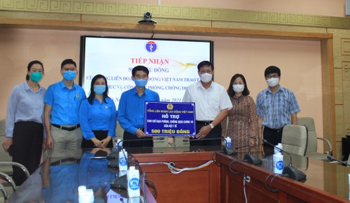 越南劳动总联合会与遭受疫情影响的企业并肩前行 - ảnh 1