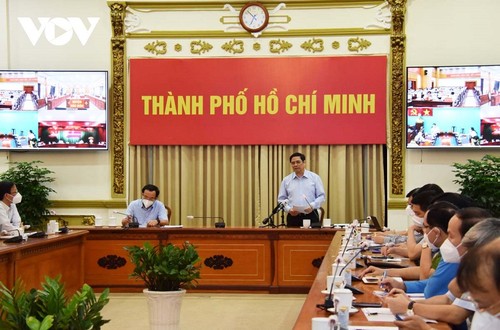 越南政府总理范明政与胡志明市领导班子举行工作会议 - ảnh 1