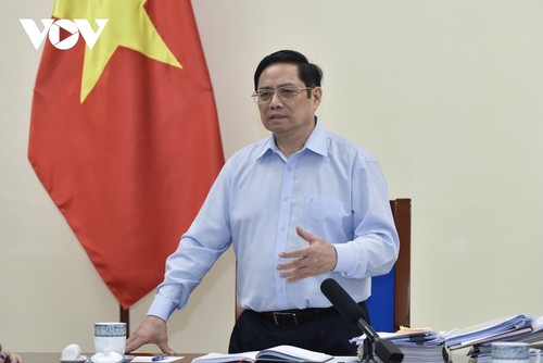越南政府总理范明政要求富寿、朔庄、金瓯三省尽快控制疫情 - ảnh 1