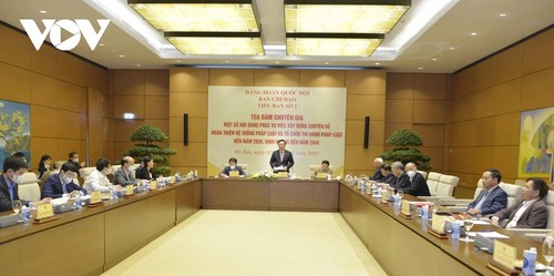 越南国会主席王廷惠主持完善法律研讨会 - ảnh 1