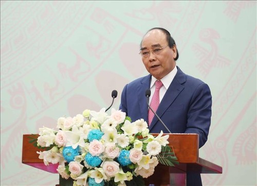  越南国家主席阮春福向在第31届东运会上取得优异成绩的运动员授予劳动勋章 - ảnh 1