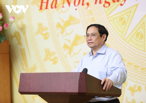  越南政府总理范明政：越南快速、有效、实质性地推动数字化转型 - ảnh 1