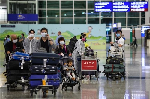 中国将从2月6日起全面开放与香港、澳门的跨境旅行 - ảnh 1