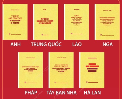  越共中央总书记阮富仲《社会主义理论和实践若干问题以及越南走向社会主义道路》7种语言版本发布仪式在河内举行 - ảnh 1