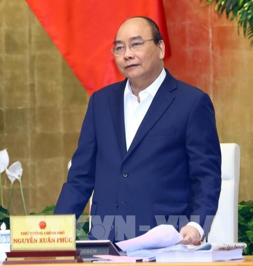Premierminister Nguyen Xuan Phuc nimmt an Tagung zur Förderung der Automobilindustrie teil - ảnh 1
