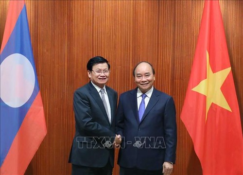 Der laotische Premierminister besucht Vietnam und ist Ko-Vorsitzender der Sitzung der vietnamesisch-laotischen Regierung - ảnh 1