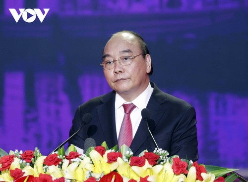 Staatspräsident Nguyen Xuan Phuc nimmt an Feier zum 550. Jahrestag der Bezeichnung von Quang Nam teil - ảnh 1