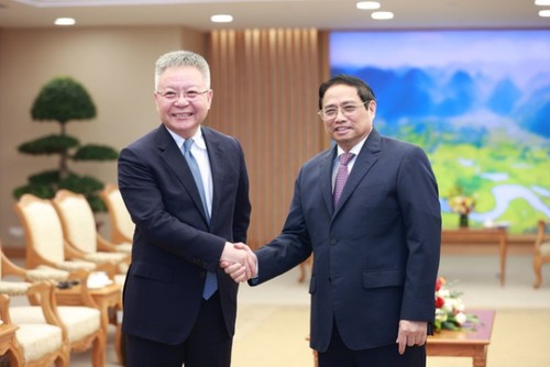 Premierminister Pham Minh Chinh trifft Parteichef der chinesischen Provinz Hainan  - ảnh 1