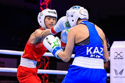 Vietnamesische Boxerin besiegt die zweimalige Weltmeisterin  - ảnh 1