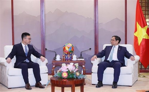 Premierminister Pham Minh Chinh trifft Leiter chinesischer Konzerne für Technologie, Energie und Infrastrukturentwicklung - ảnh 1