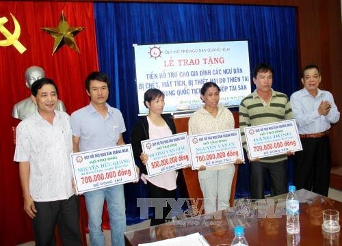 越南近二十万户灾民家庭获得资助 - ảnh 1