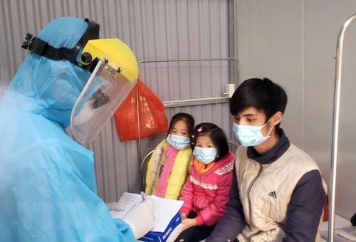 Ärzte und Krankenpflege kämpfen gegen Covid-19 in Binh Xuyen - ảnh 3