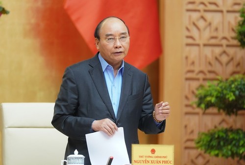 Premierminister: Hanoi, Ho-Chi-Minh-Stadt und zehn andere Provinzen führen Konzept der sozialen Distanzierung weiter - ảnh 1