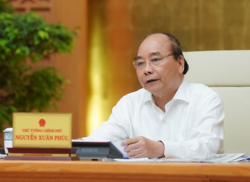 Premierminister: Hanoi gehört nun der Gruppe mit mittlerem Risiko an, muss aber weiter die Epidemie-Bekämpfung gewähren - ảnh 1