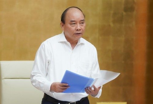 Premierminister Nguyen Xuan Phuc leitet die Regierungssitzung über Covid-19 - ảnh 1