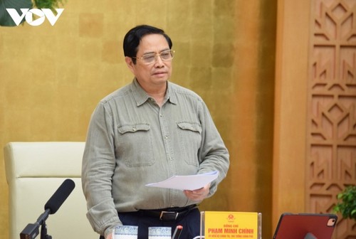 Premierminister Pham Minh Chinh: Lockerung der sozialen Distanzierung muss vorsichtig durchgeführt werden - ảnh 1