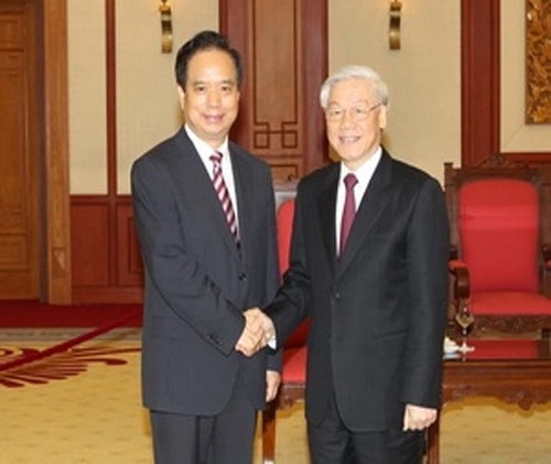 Sekjen Komite Sentral Partai Komunis Vietnam, Nguyen Phu Trong menerima delegasi Partai Komunis Tiongkok - ảnh 1