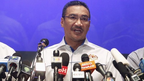 Malaysia tidak melepaskan pencarian pesawat terbang MH 370 yang hilang - ảnh 1