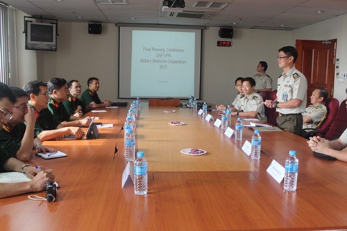 Singapura dan Vietnam memperkuat kerjasama tentang kedokteran militer - ảnh 1