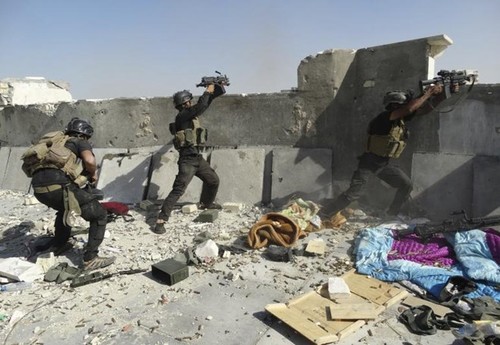 Irak merebut kembali satu kotamadya dari IS - ảnh 1