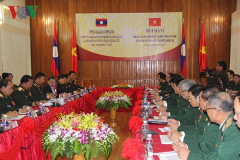Menandatangani kerjasama pertahanan antara Kemhan dua negara Vietnam-Laos - ảnh 1