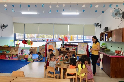 Sekolah yang berstandar internasional untuk anak-anak kaum buruh miskin di Kota Da Nang - ảnh 2
