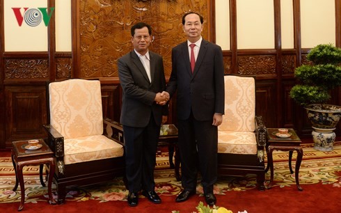 Presiden Vietnam, Tran Dai Quang menerima Deputi Menteri Keamanan Laos - ảnh 1
