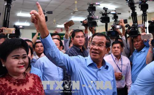Partai Rakyat Kamboja merebut kemenangan mutlak dalam pemilu Parlemen - ảnh 1