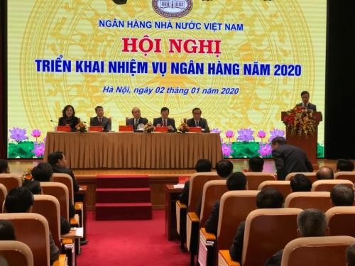 PM Nguyen Xuan Phuc menghadiri konferensi menggelarkan tugas Bank Negara tahun 2020 - ảnh 1
