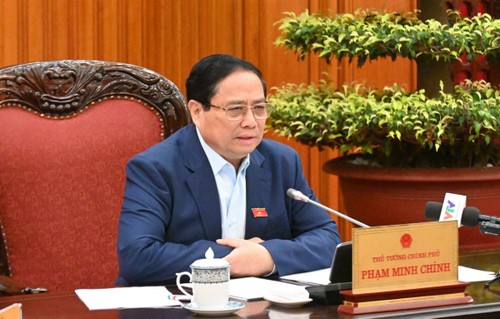 PM Pham Minh Chinh Memimpin Rapat tentang Penjaminan Stabilitas Ekonomi Makro, Pengontrolan Inflasi, Pendorongan Pertumbuhan Ekonomi - ảnh 2