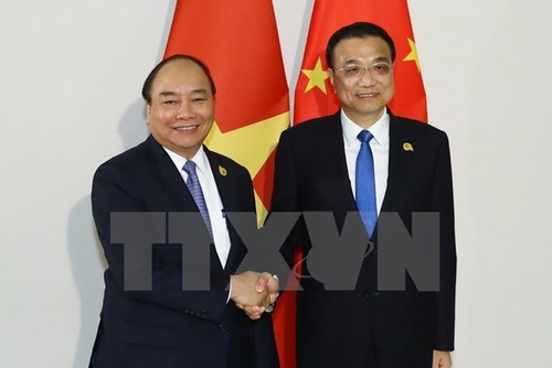 PM meets with Chinese, Thai counterparts - ảnh 1