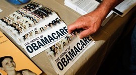 Более 100.000 американцев приобрели себе медстраховку "Обамакер" в октябре - ảnh 1