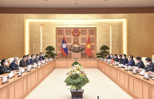 Вьетнам и Лаос поддерживают друг друга на многосторонних форумах - ảnh 1