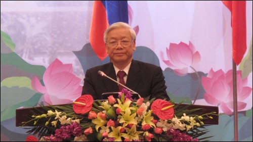 Chiêu đãi trọng thể Tổng Bí thư, Chủ tịch nước Lào - ảnh 1