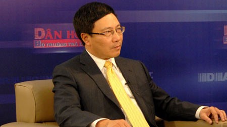 Bộ trưởng Bộ Ngoại giao Phạm Bình Minh trả lời về Cộng đồng ASEAN - ảnh 1