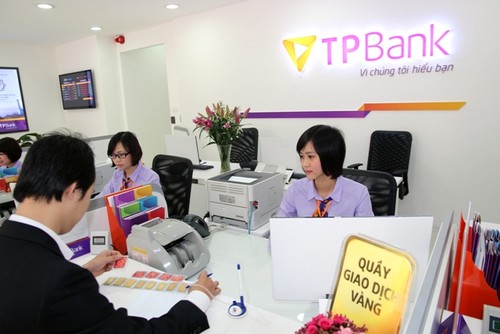 TPBank, Ngân hàng cổ phần đầu tiên công bố kết quả kinh doanh ấn tượng năm 2014  - ảnh 1