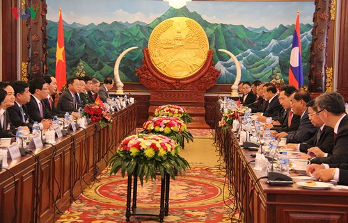 Chủ tịch nước Trần Đại Quang bắt đầu chuyến thăm cấp nhà nước tới CHDCND Lào - ảnh 3
