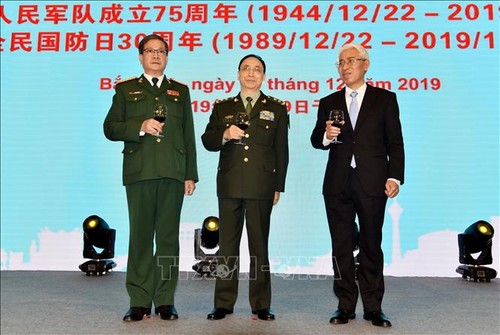 Kỷ niệm ngày thành lập QĐND Việt Nam và Ngày Quốc phòng toàn dân tại Trung Quốc  - ảnh 1