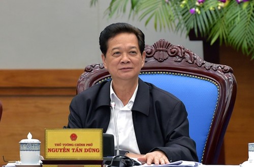 PM Nguyen Tan Dung melakukan kunjungan kerja di Laos - ảnh 1