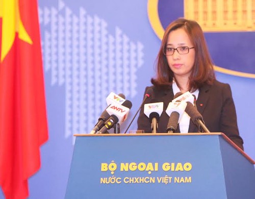 Vietnam menentang semua tindakan pembangunan dan perluasan dari negara asing di pulau-pulau batu di kawasan kepulauan Hoang Sa dan Truong Sa - ảnh 1
