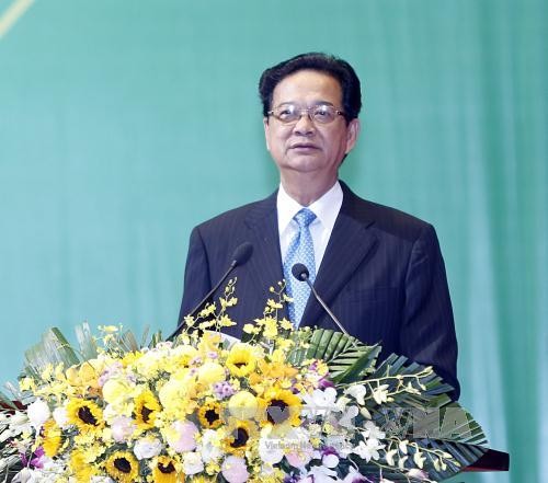 PM Nguyen Tan Dung : produksi dan bisnis tidak memberikan pengaruh buruk kepada lingkungan hidup - ảnh 1