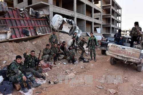 Tentara Suriah merebut kontrol atas beberapa kawasan penting di kota Aleppo - ảnh 1